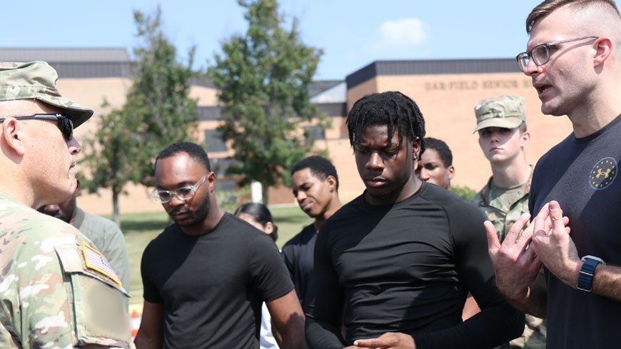 Recruiters speak with high school students